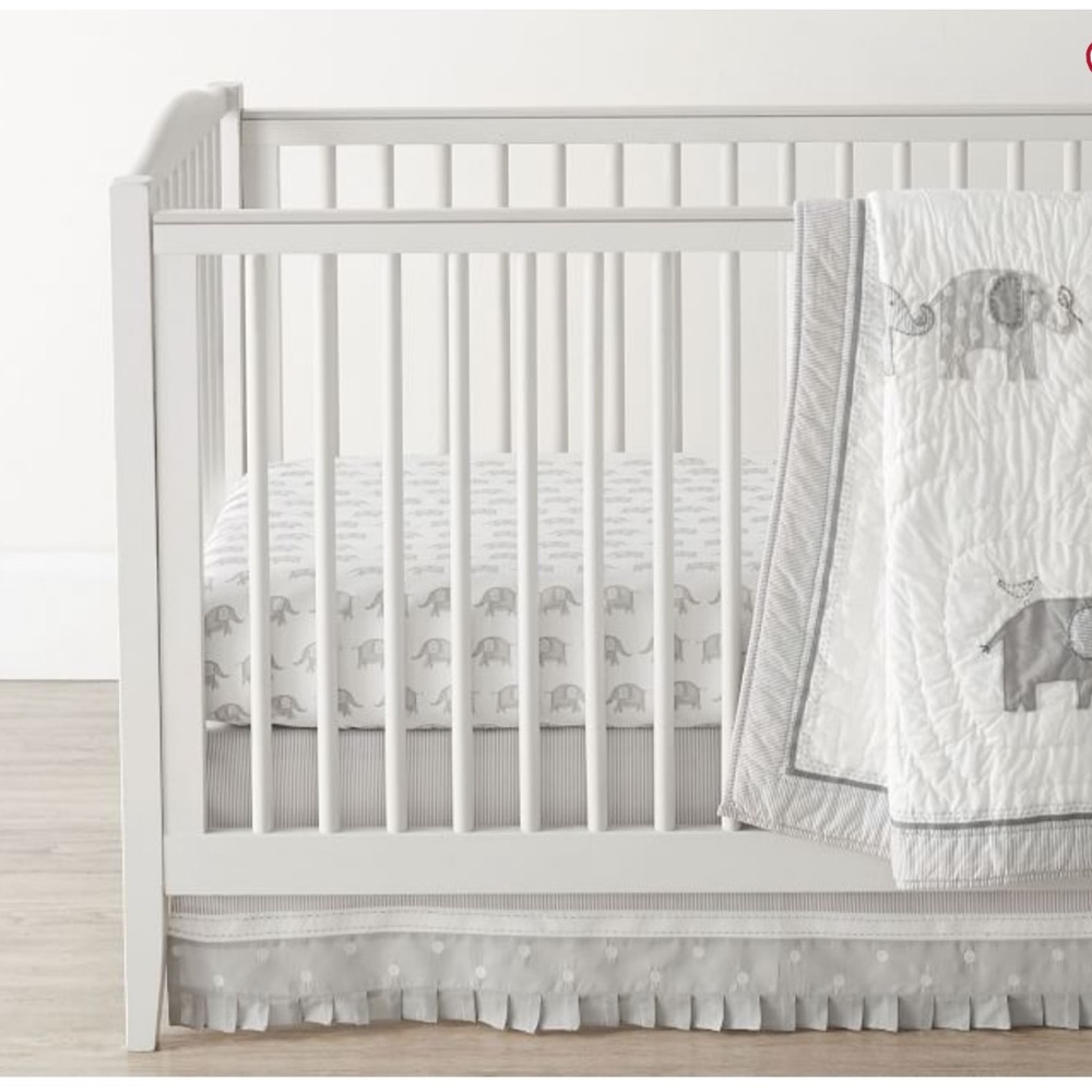 Pottery Barn “Taylor” crib bumper and matching Crib Skirt